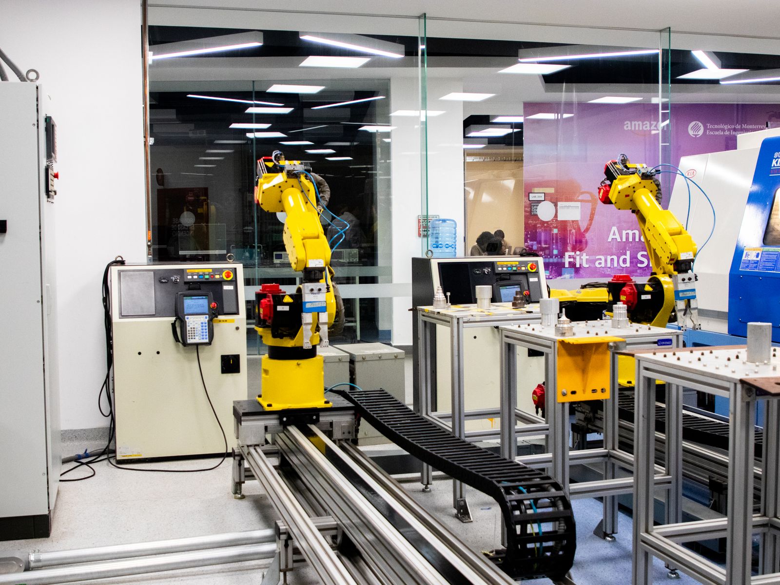 Robotic arms on an automated production line